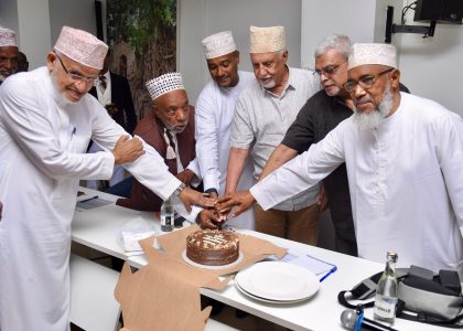 Cutting the cake at the launch of the Arabic and Islamic Studies curriculum, Mombasa